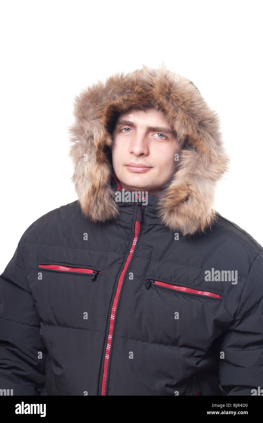 Caucasian man in winter sport jacket with fur. Isolated on white. Stock Photo