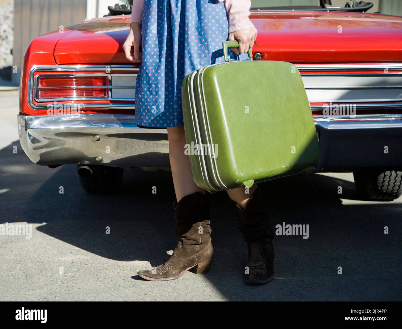 woman holding a suitcase Stock Photo