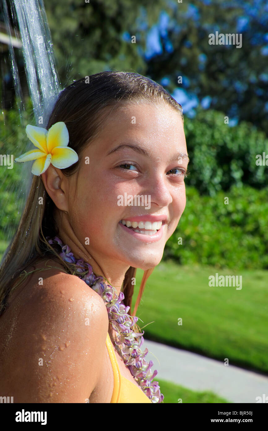 Beautiful Teenager In Yellow Bikini Taking A Shower