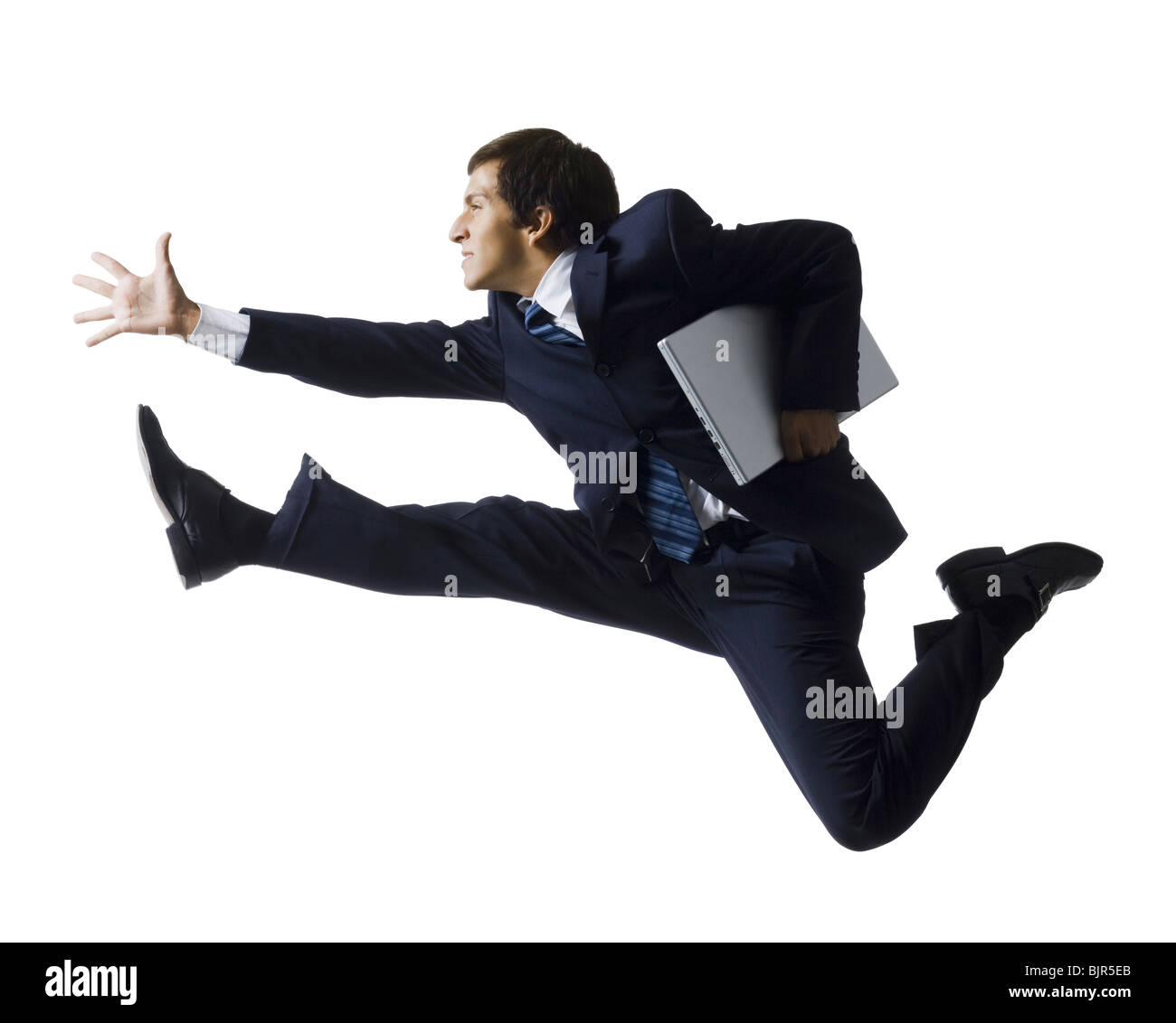 businessman jumping in the air Stock Photo