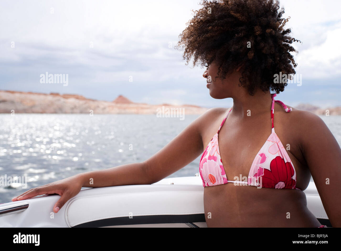 Woman in bikini on boat Stock Photo - Alamy
