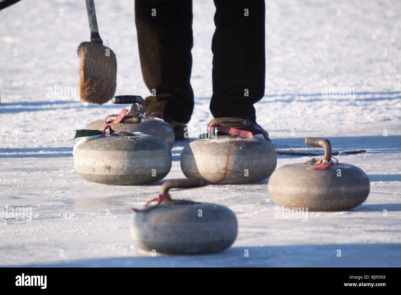 Curling on frozen Lake of Menteith Scotland Stock Photo