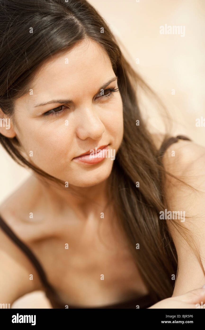 Woman in brown top Stock Photo - Alamy