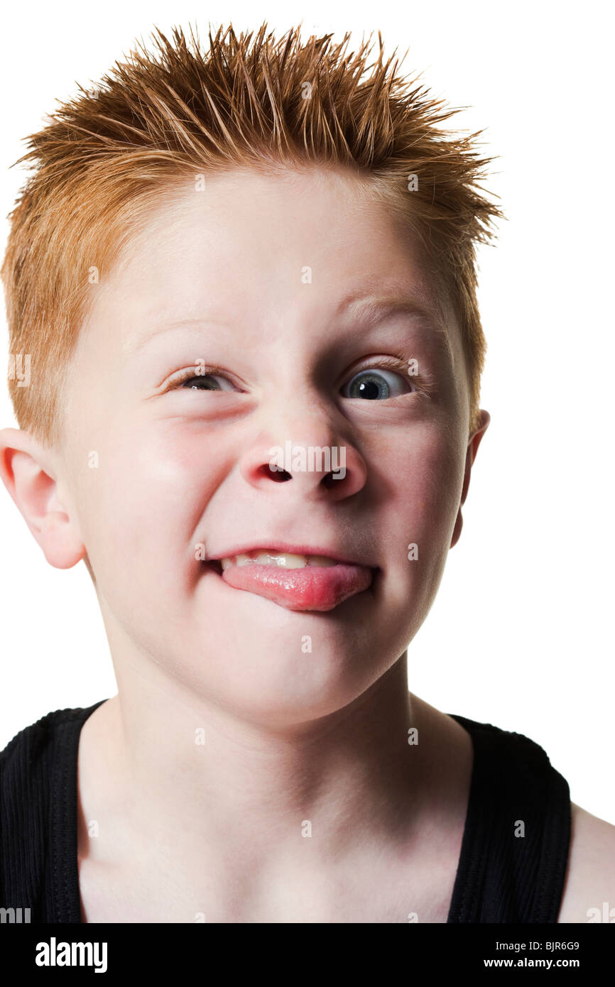 Boy pulling funny face Stock Photo Alamy