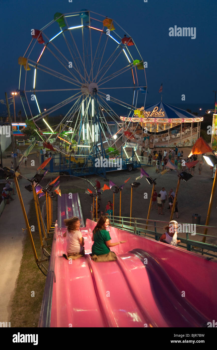 Children taking rides at Carolina Beach Boardwalk Amusement Park, North
