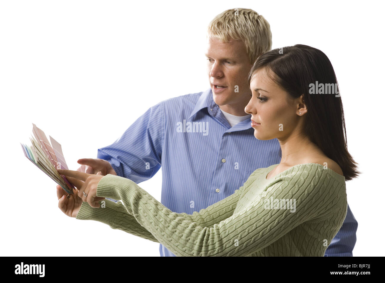 Couple reviewing color swatches Stock Photo - Alamy