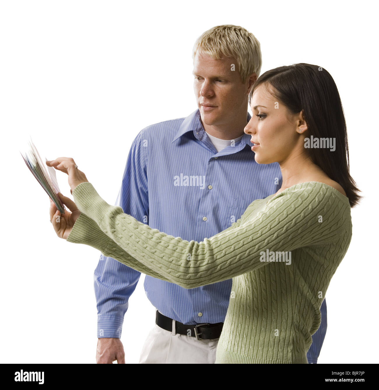 Couple reviewing color swatches Stock Photo - Alamy