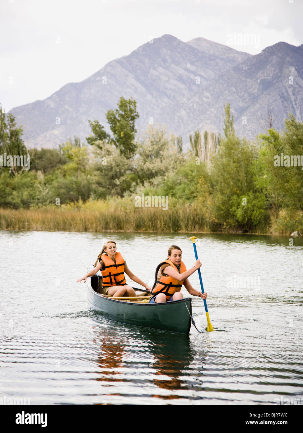 two girls in a canoe Stock Photo - Alamy