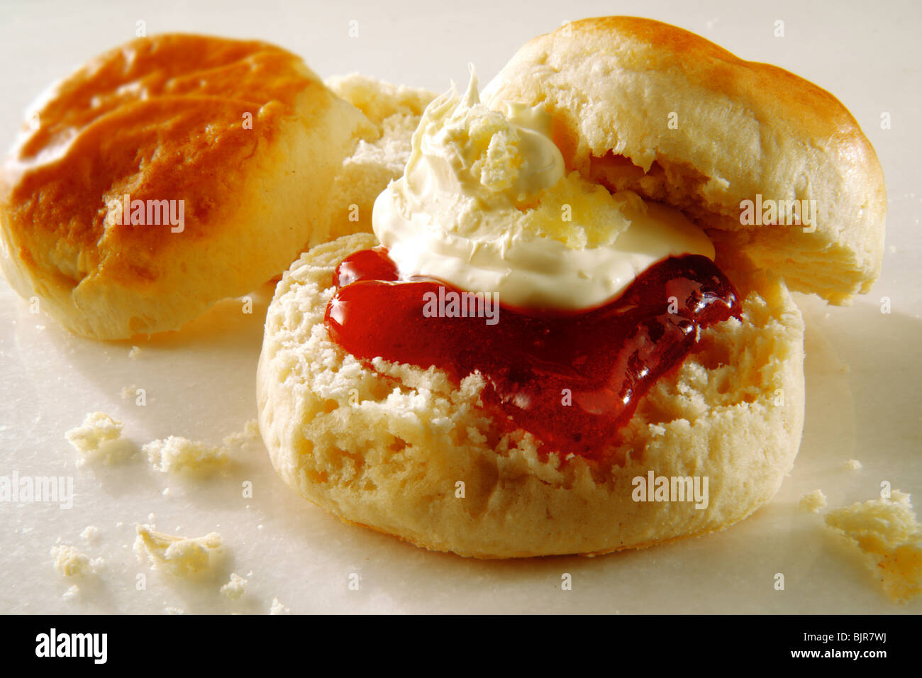 Traditional British sweet scones, clotted cream and jam Stock Photo
