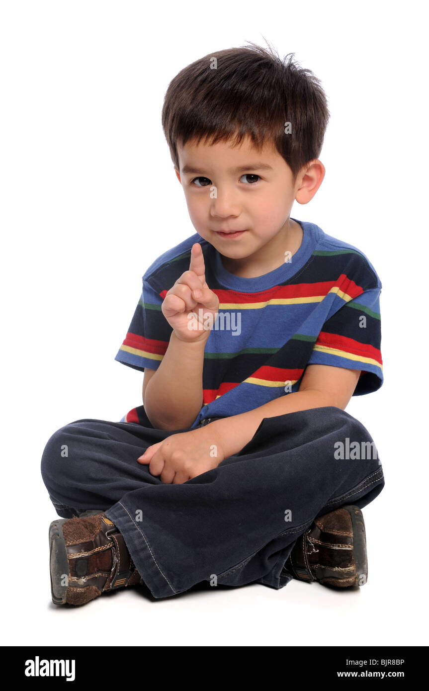 Young boy gesturing number one isolated over white background Stock Photo
