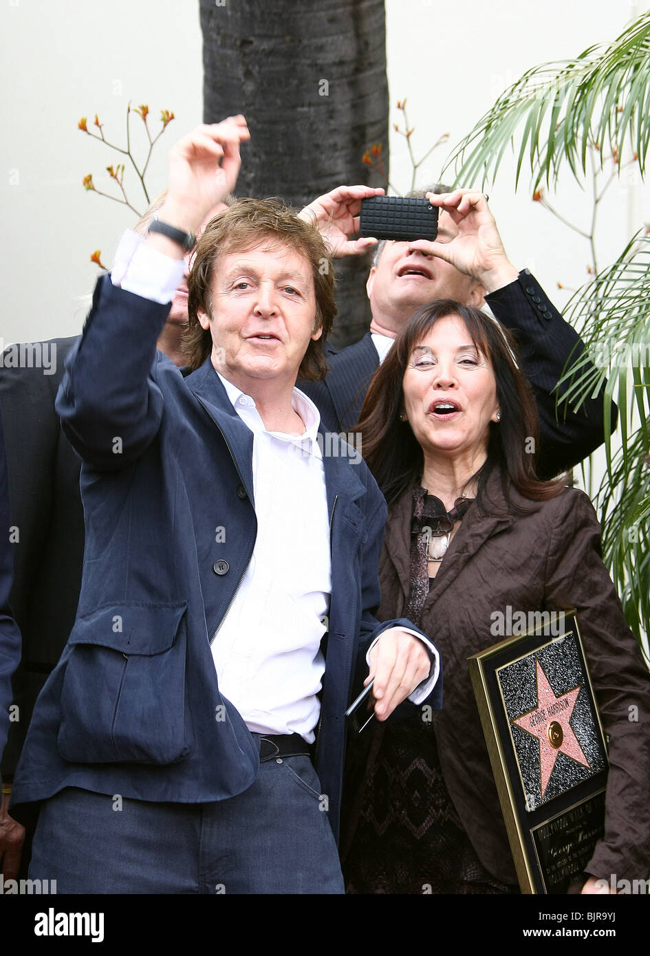 PAUL MCCARTNEY TOM HANKS OLIVIA HARRISON GEORGE HARRISON HONORED POSTHUMOUSLY WITH A STAR ON THE HOLLYWOOD WALK OF FAME HOLLYW Stock Photo