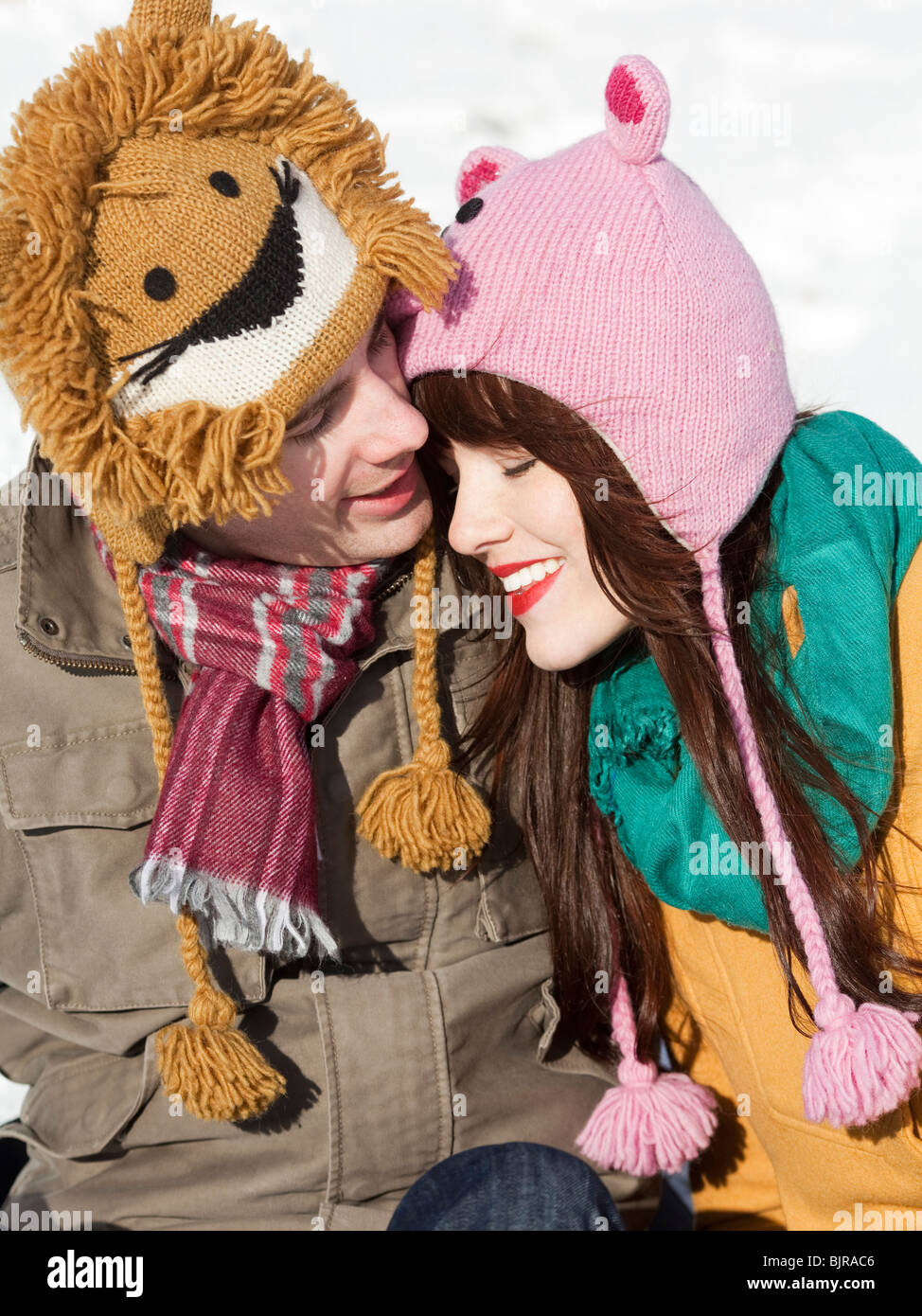 Orem, Utah, USA, boyfriend and girlfriend wearing funny knit hats,  embracing Stock Photo - Alamy