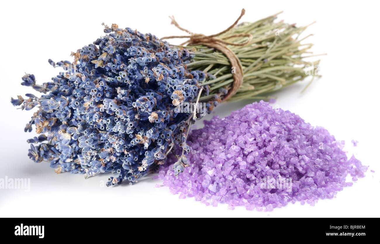 handful of sea salt flavored with dried lavender flowers Stock Photo