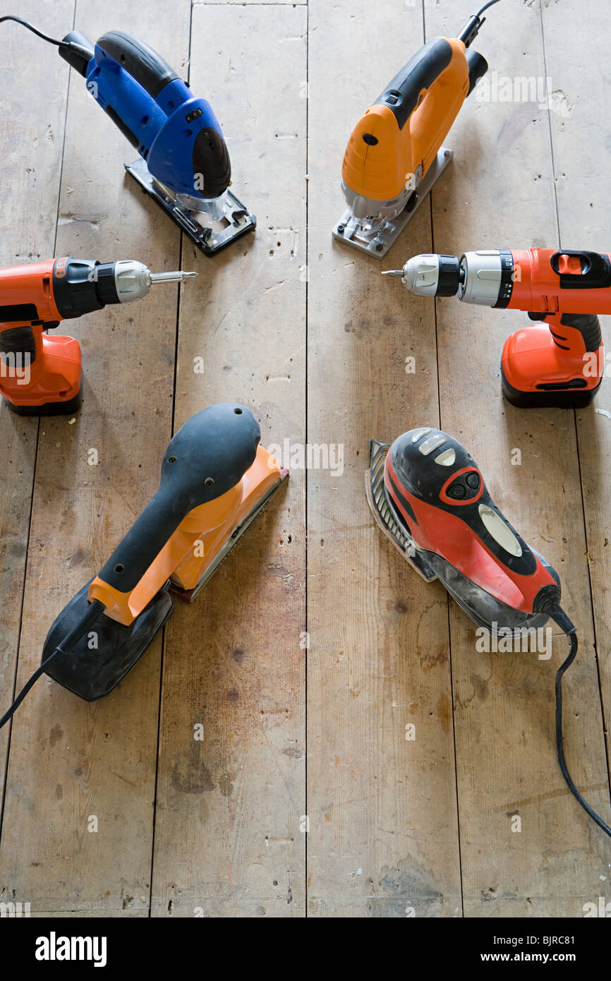 Power tools on floor Stock Photo
