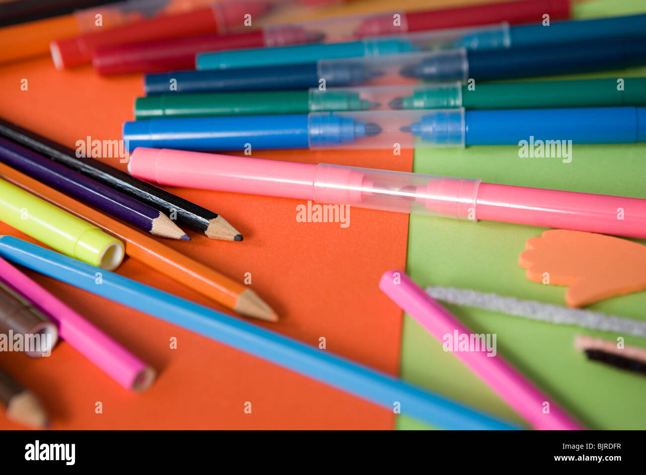 Coloured pencils and felt tip pens Stock Photo Alamy
