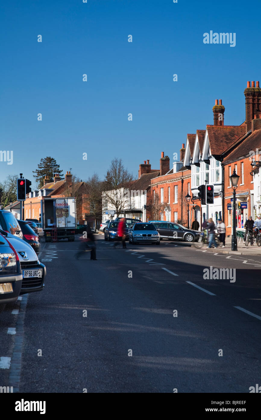 View along the busy High Steet in Odiham, Hampshire, Uk Stock Photo