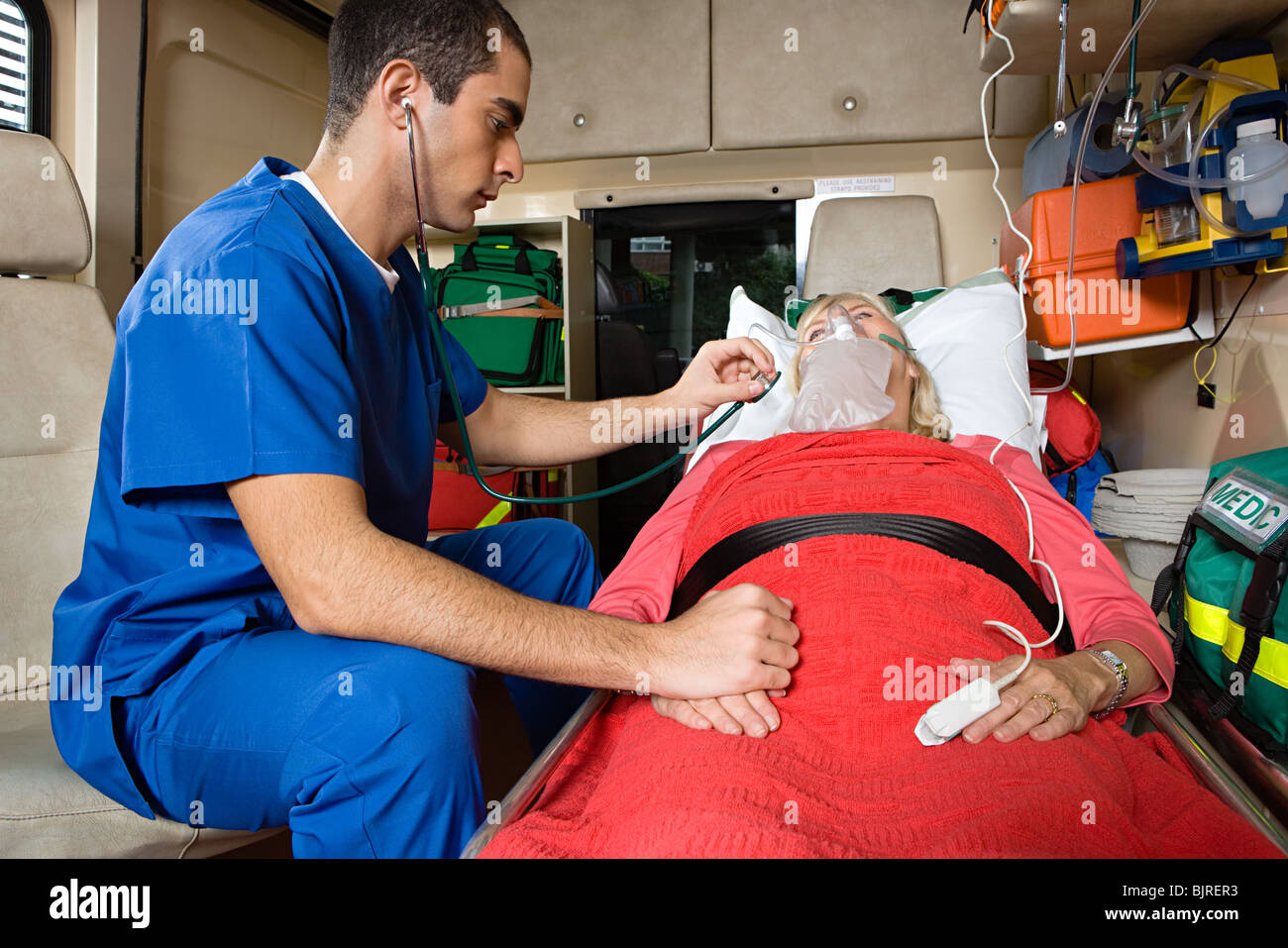 Nurse and patient in ambulance Stock Photo Alamy
