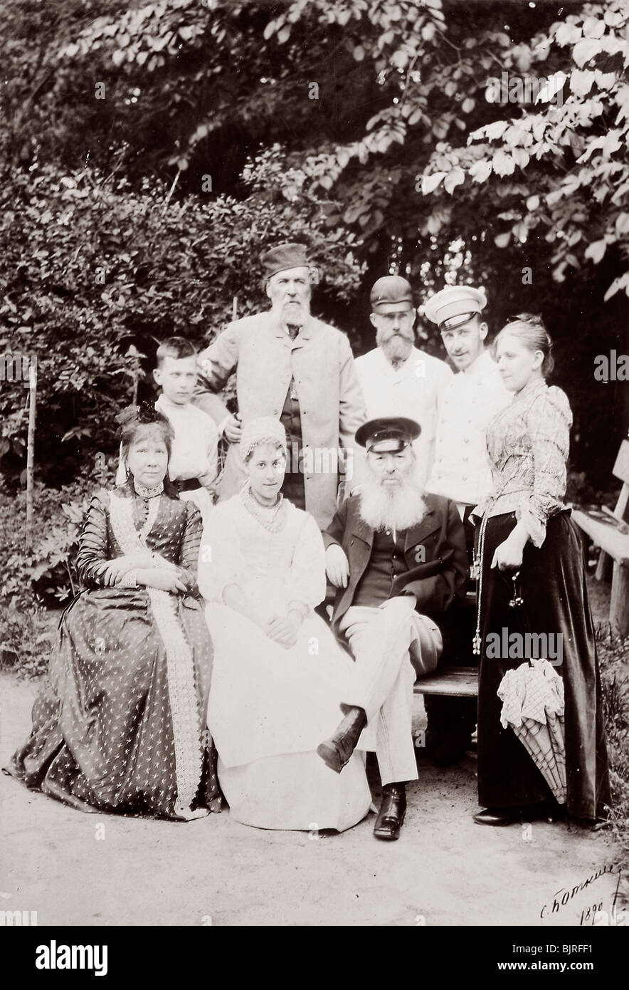 Russian poet Yakov Polonsky and his family visiting the poet Afanasy Fet, c1890.  Artist: Sergei Dmitrievich Botkin Stock Photo