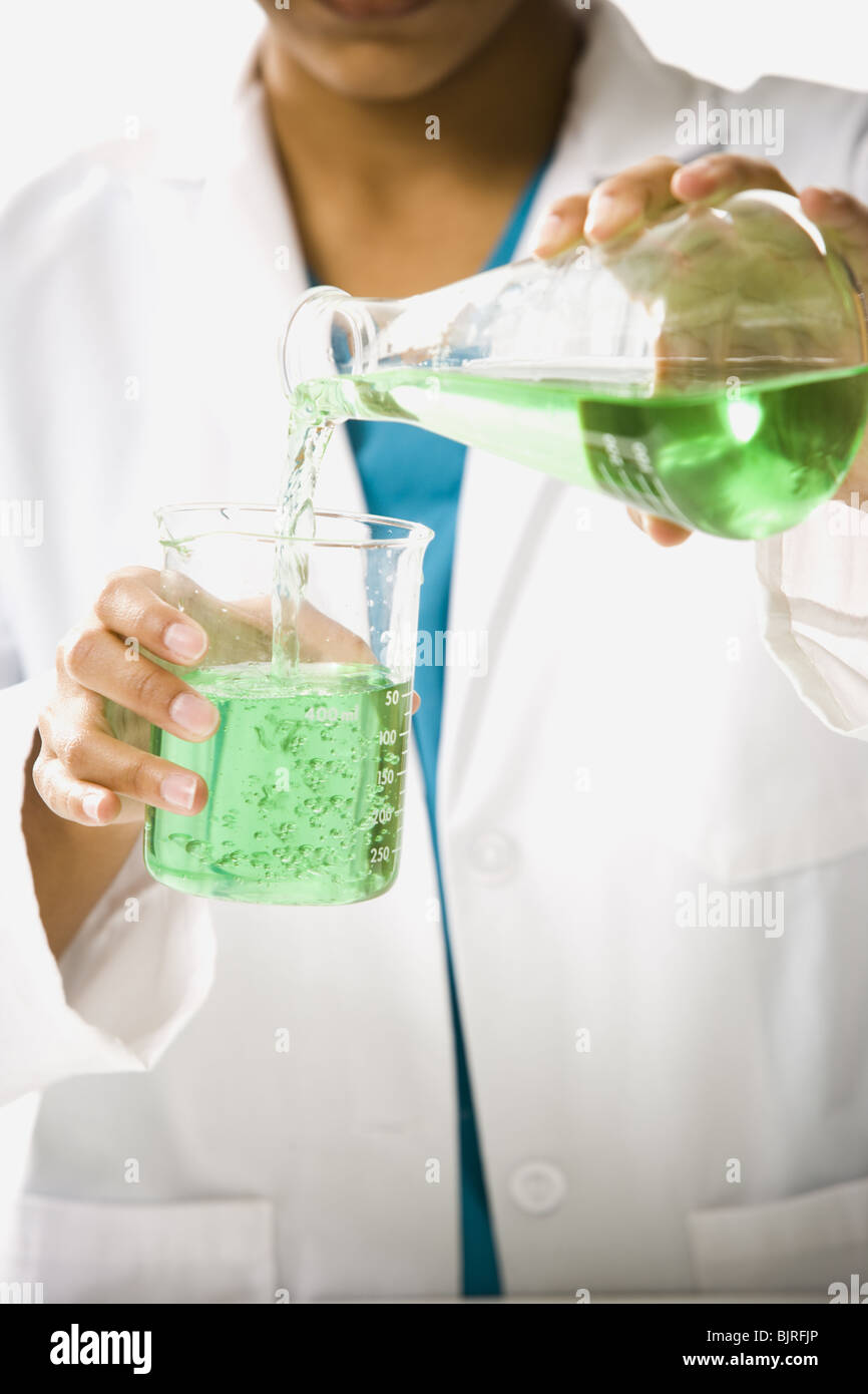 Scientist mixing chemicals Stock Photo Alamy