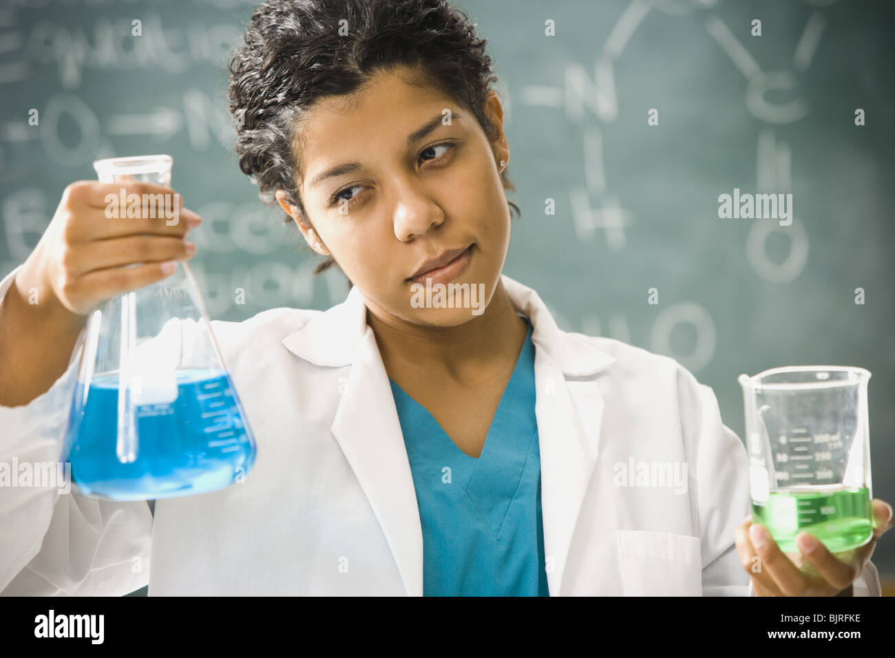 Scientist mixing chemicals Stock Photo Alamy