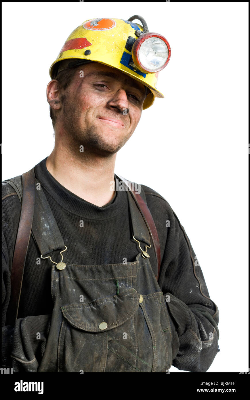 Mine worker with flashlight helmet Stock Photo