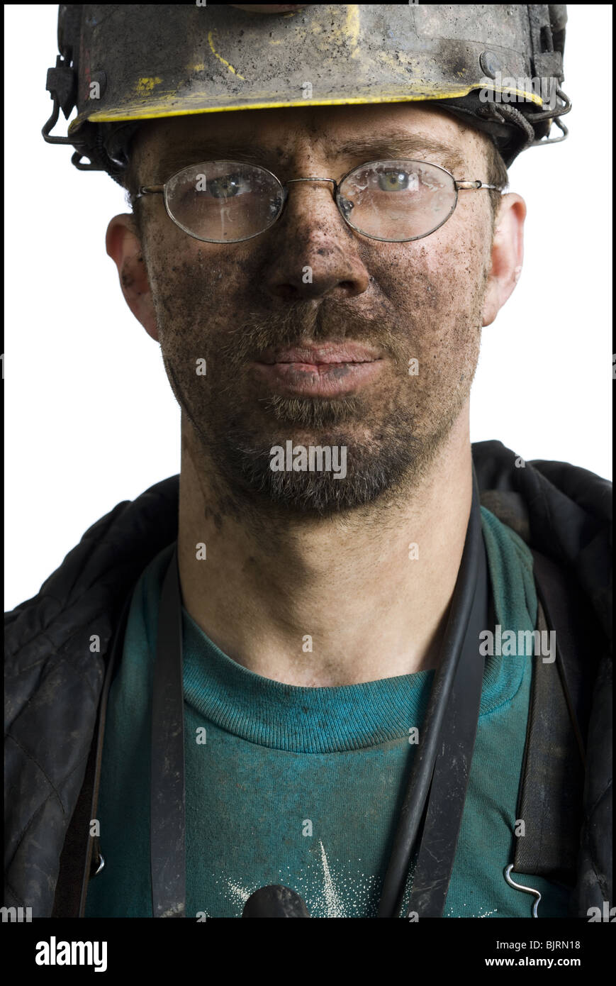 Mine worker with flashlight helmet Stock Photo