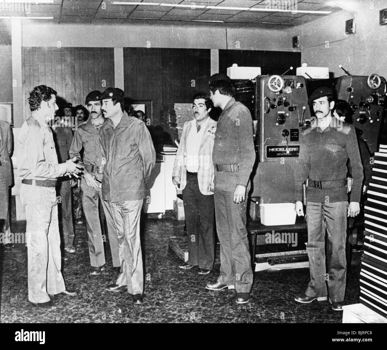 Saddam Hussein visiting a state paper press, Baghdad, Iraq, 1986. Artist: Unknown Stock Photo