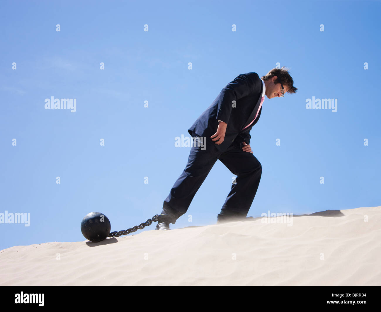 Walking With A Ball And Chain  Great PowerPoint ClipArt for