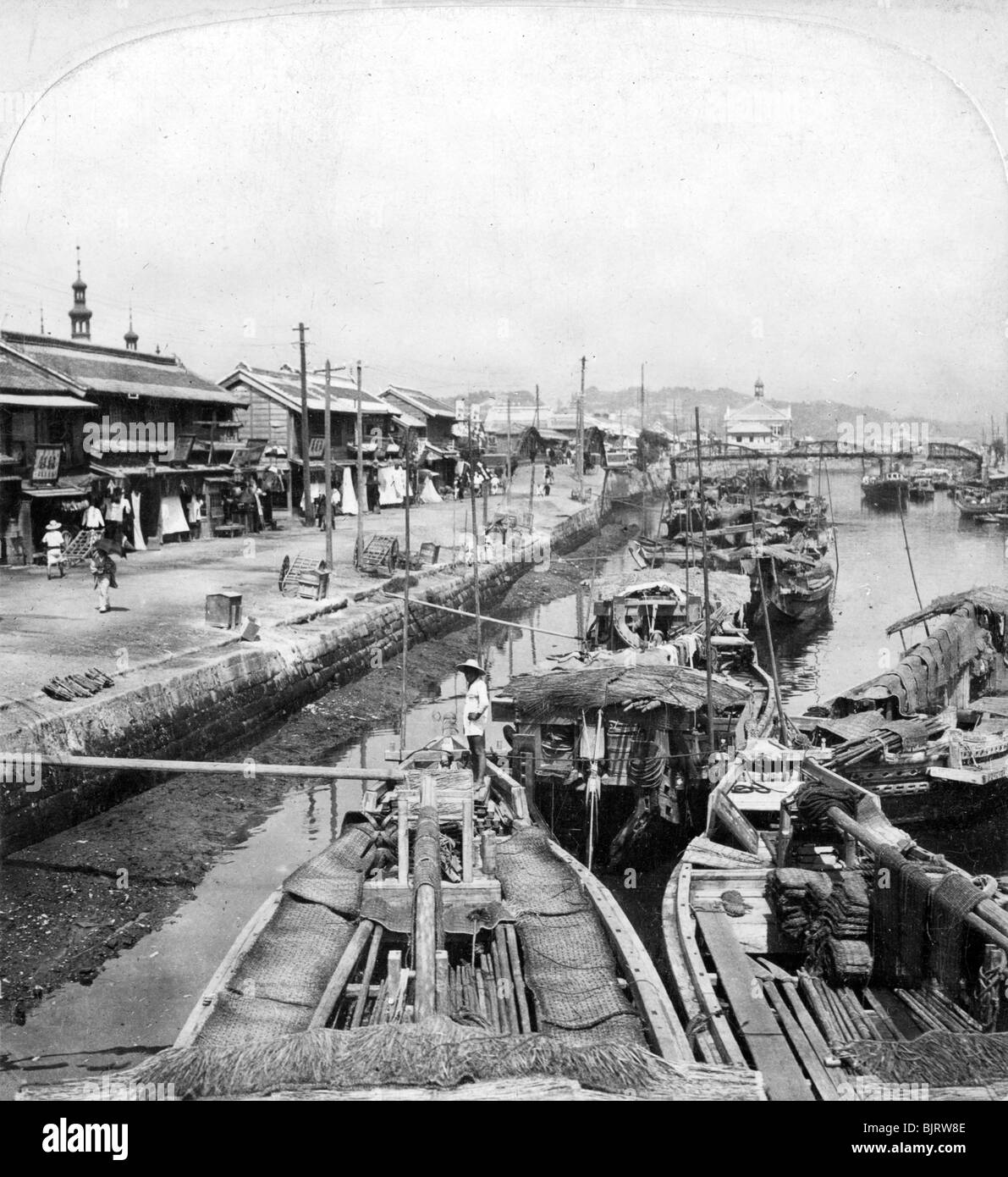Native boats on a waterway in Yokohama, Japan, 1901.Artist: Clarence H White Stock Photo