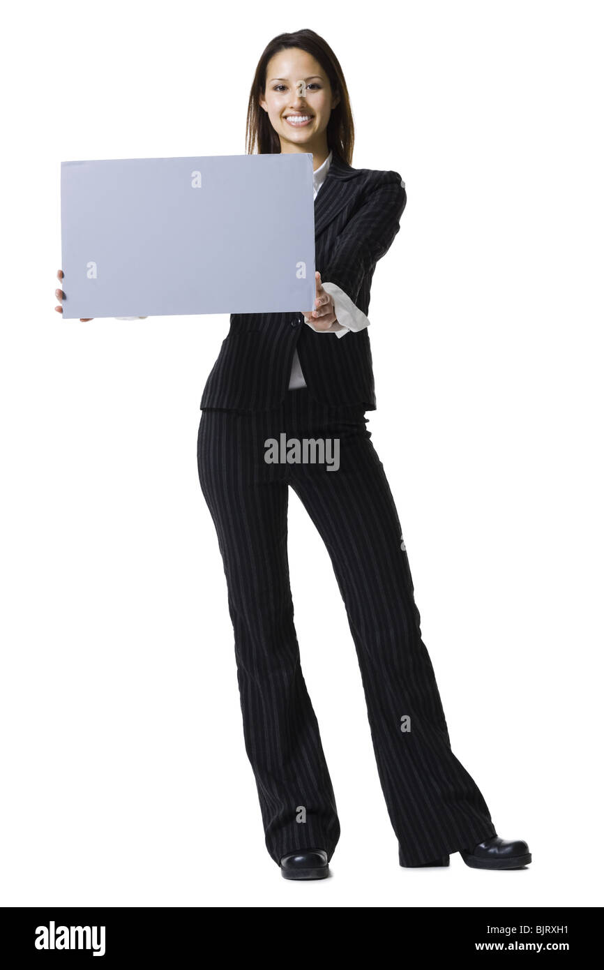 Woman holding a blank sign Stock Photo