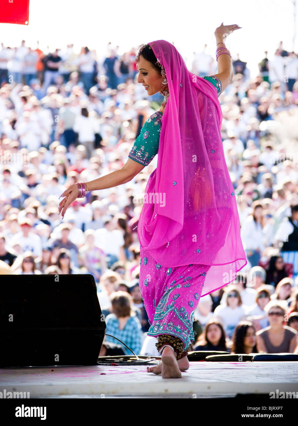 USA, Utah, Spanish Fork, mid adult dancer in traditional clothing performing on stage Stock Photo