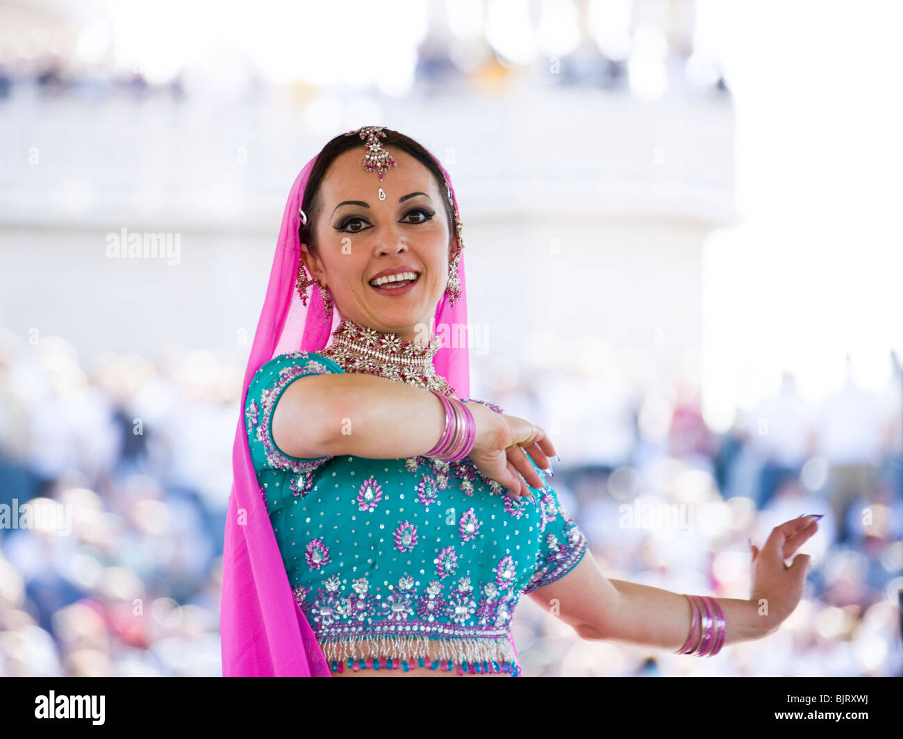 USA, Utah, Spanish Fork, portrait of mid adult dancer in traditional clothing performing on stage Stock Photo
