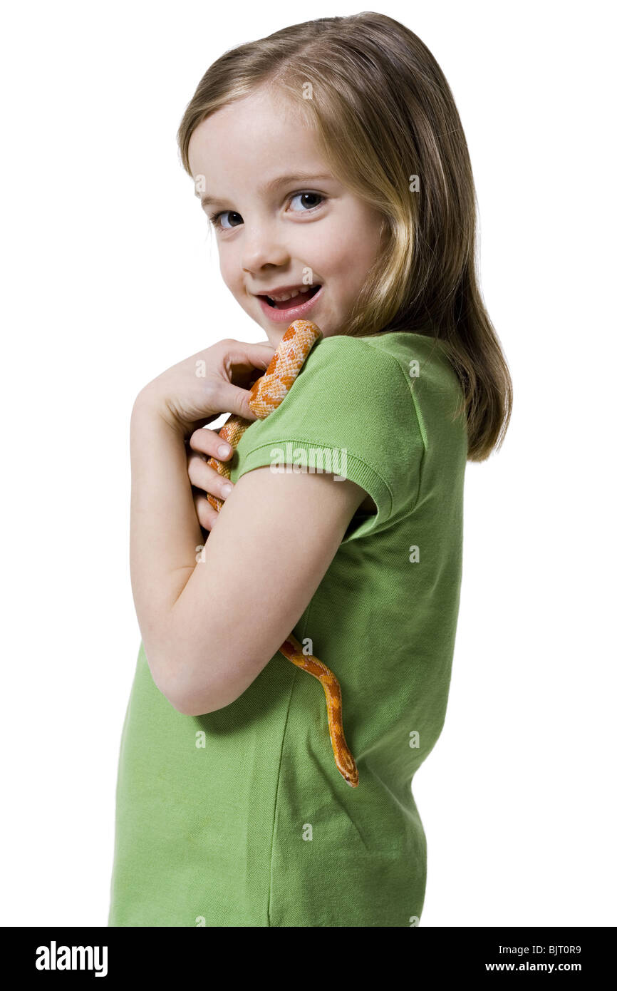 Young girl playing with a snake Stock Photo