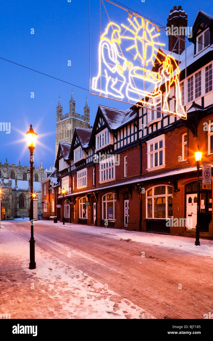 Dusk falling on winter snow and Christmas decorations in College Street