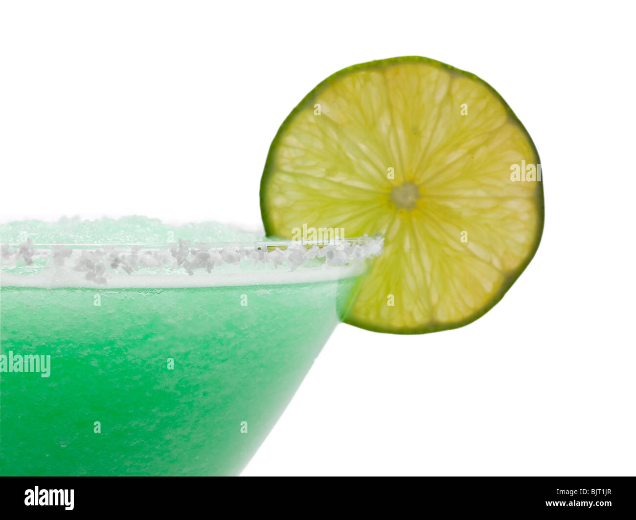Frozen martini glass with lemon slice, studio shot Stock Photo