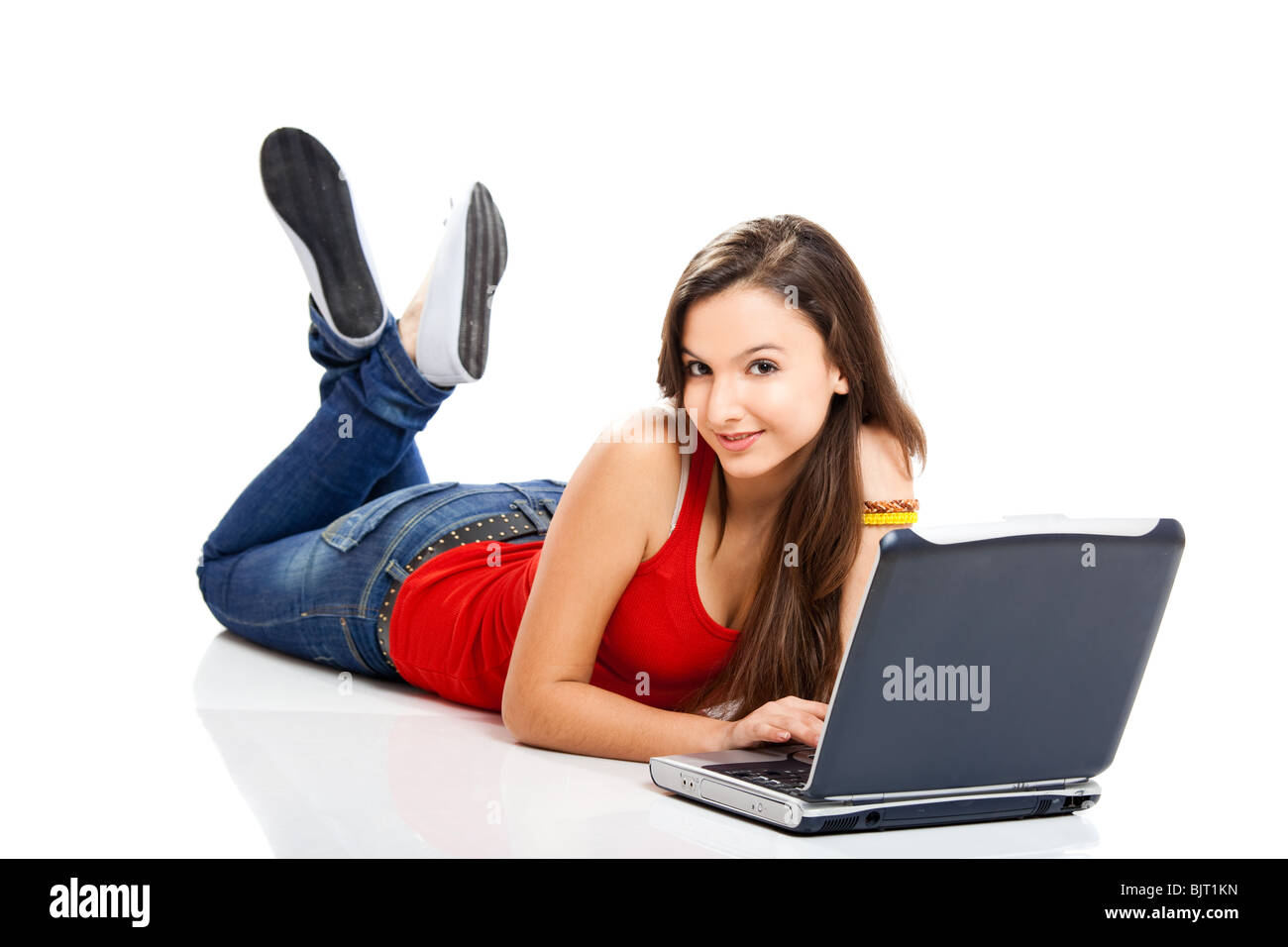 Beautiful and happy girl with a laptop, isolated on white Stock Photo ...
