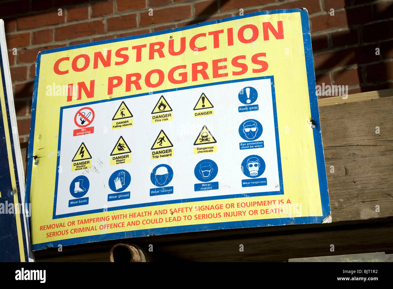 Construction in Progress health and safety notice sign Stock Photo