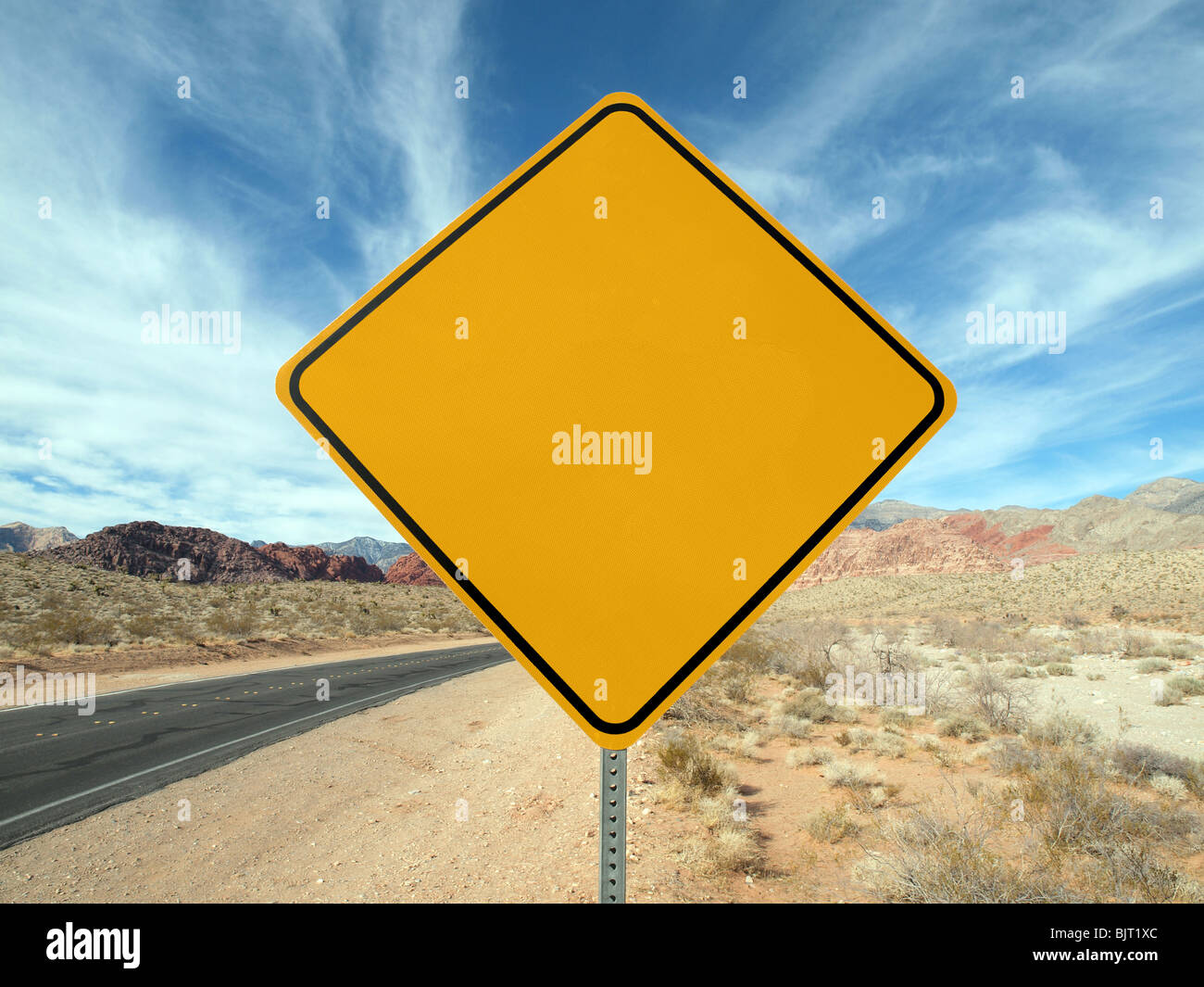 Blank highway sign crossing the Nevada desert. Stock Photo