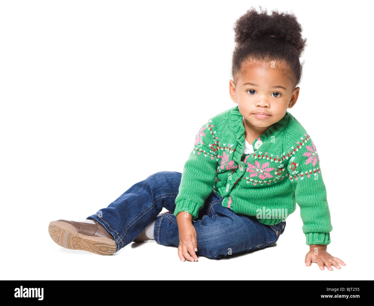 Portrait of girl (18-23 months) on white background Stock Photo