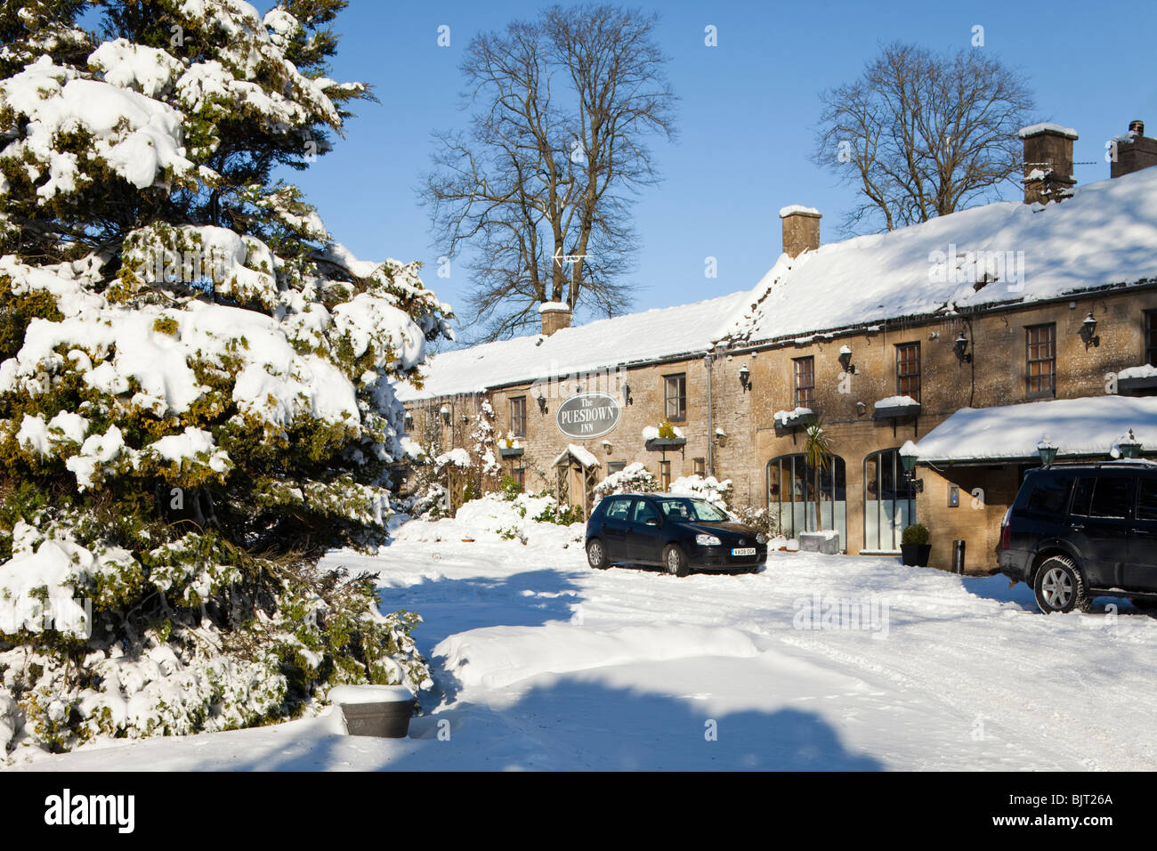 Winter snow on the Cotswolds at the Puesdown Inn, near Hazleton, Gloucestershire Stock Photo