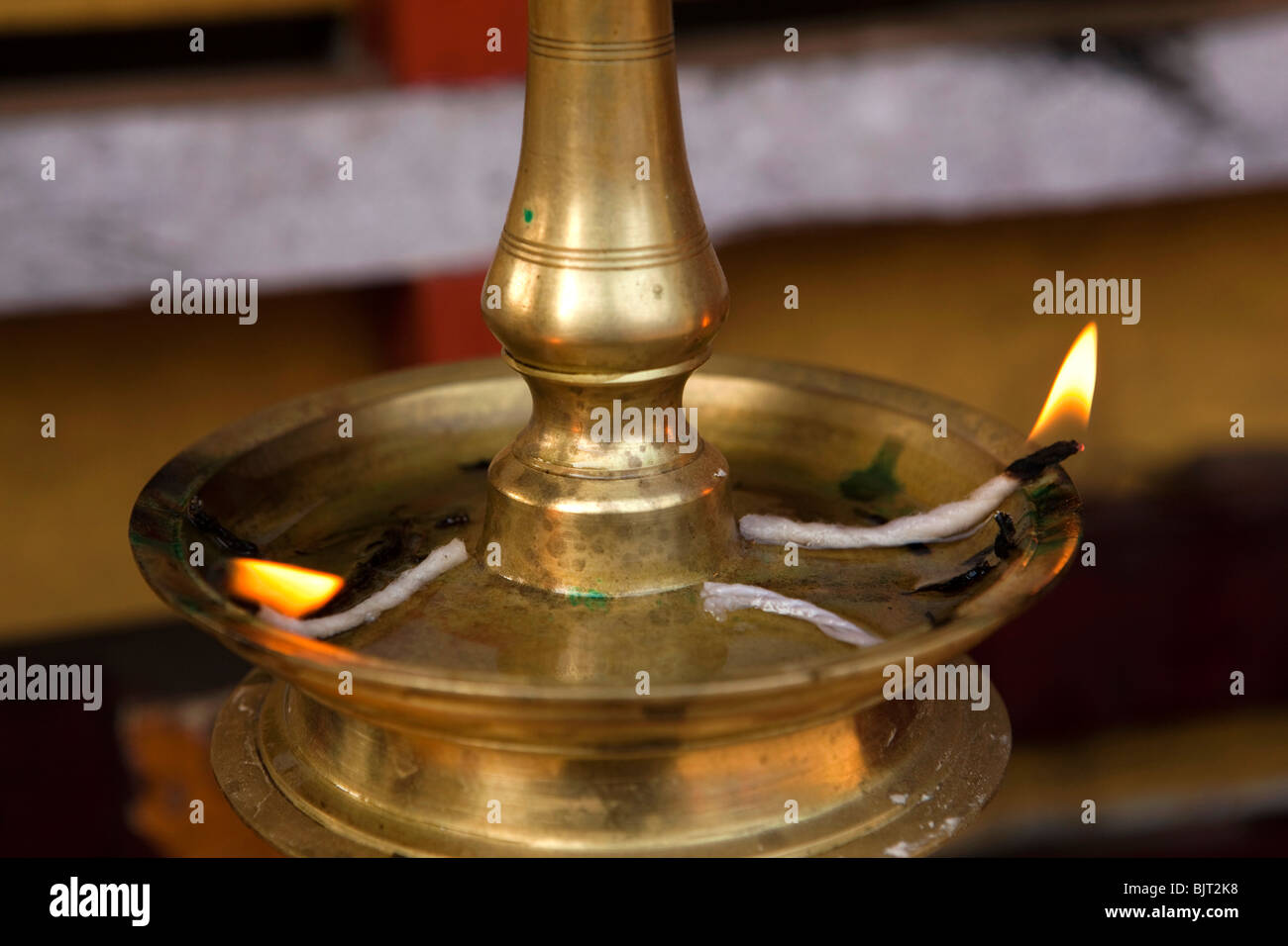 India, Kerala, Cannanore (Kannur), Theyyam, Naga Kanni ritual, temple lamp burning Stock Photo