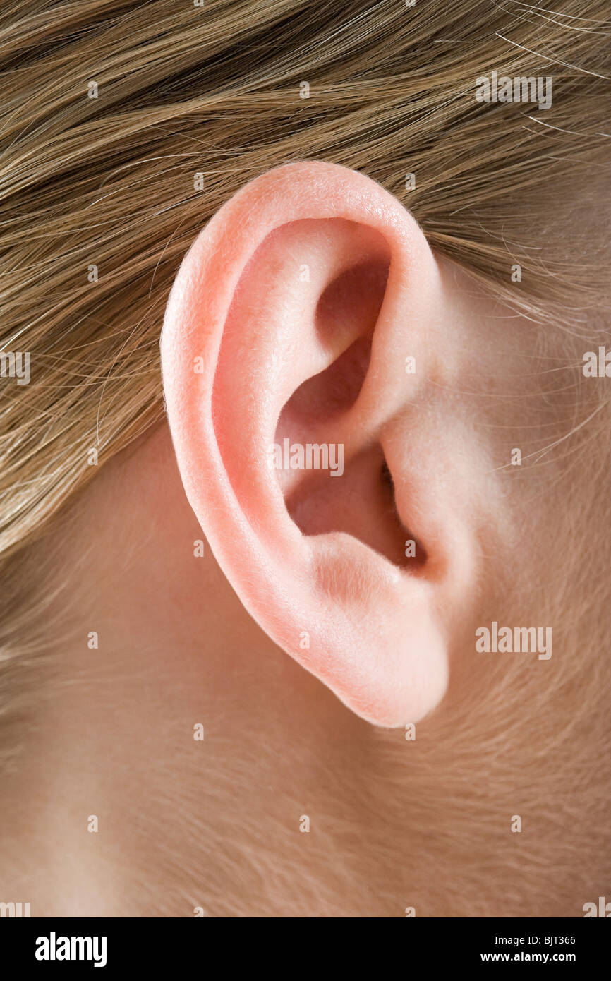 Close up of a womans ear Stock Photo