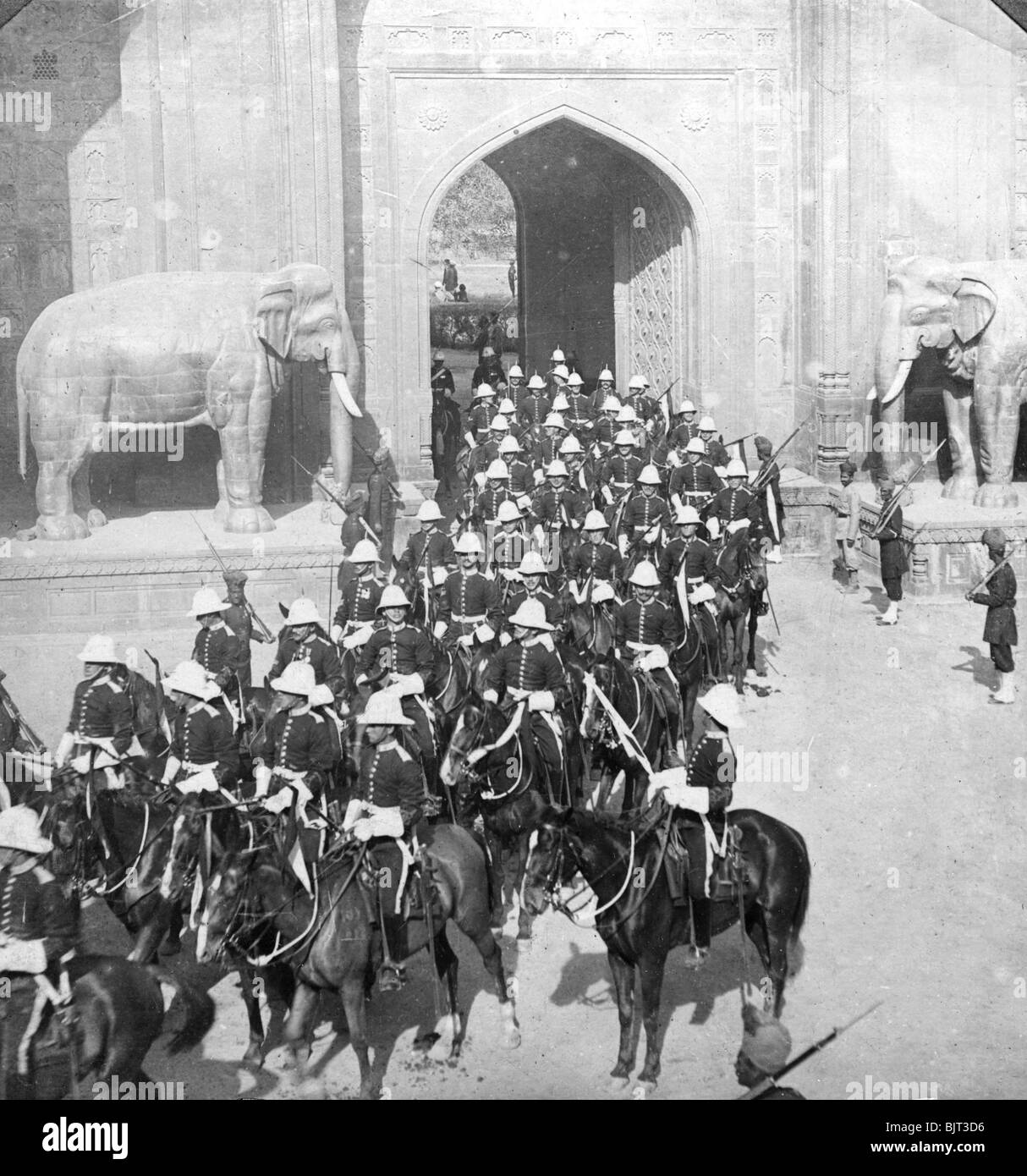 A procession passing through the Delhi Gate, Lahore, Pakistan, 1913.Artist: HD Girdwood Stock Photo