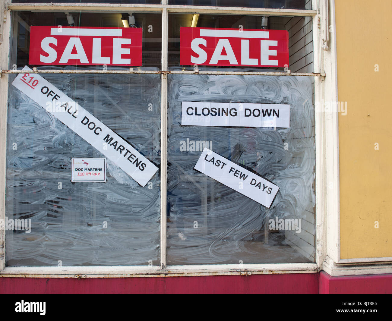 Sale signs in a shop window, Nottingham city centre, England Stock