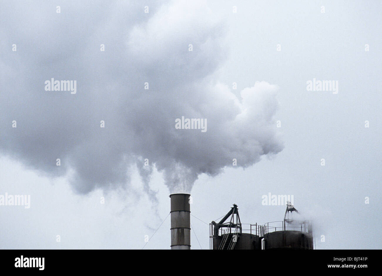 Smoke coming out of a chimney Stock Photo Alamy
