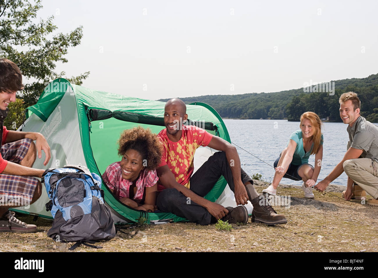 Friends camping Stock Photo