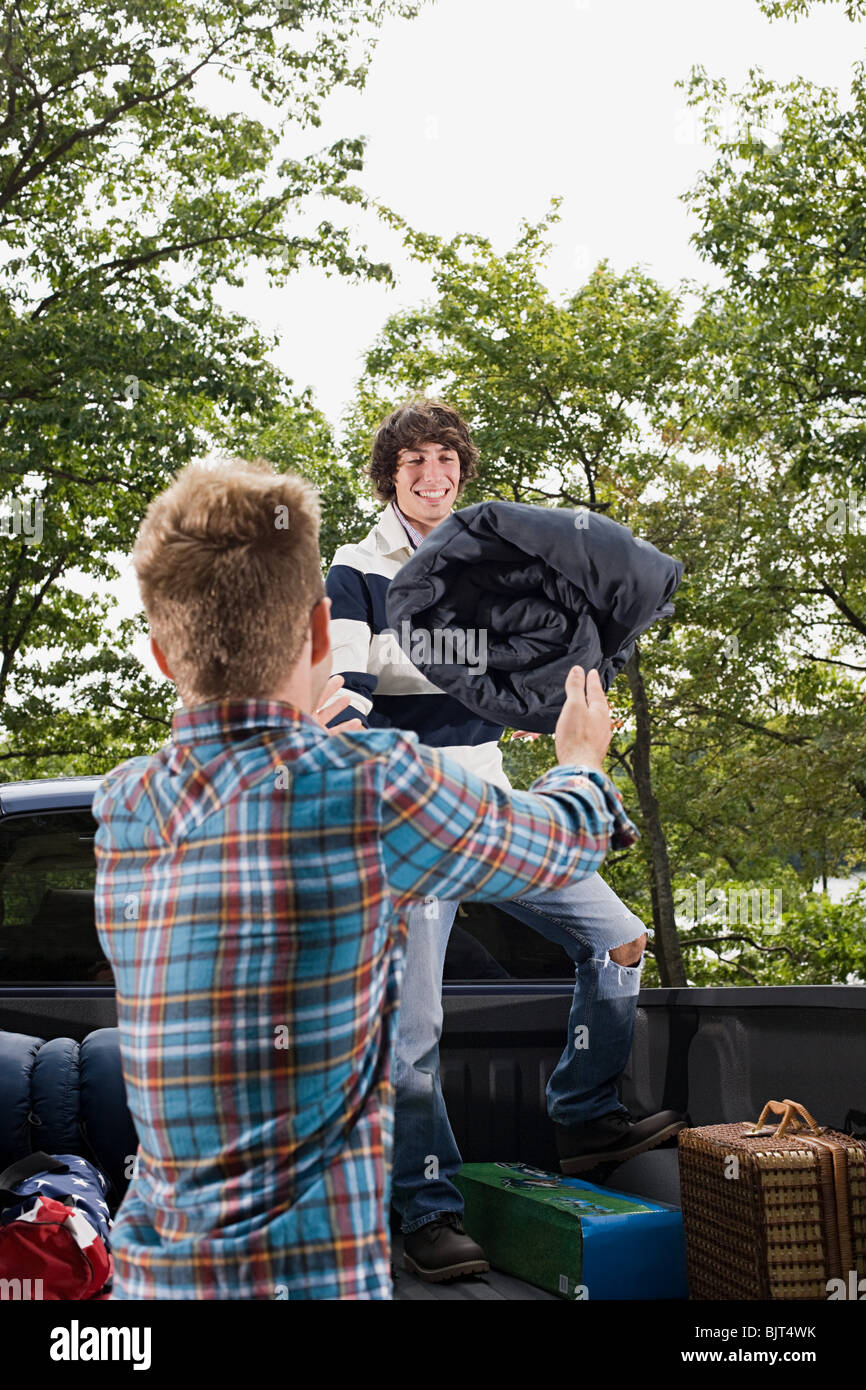 Friends with camping equipment Stock Photo