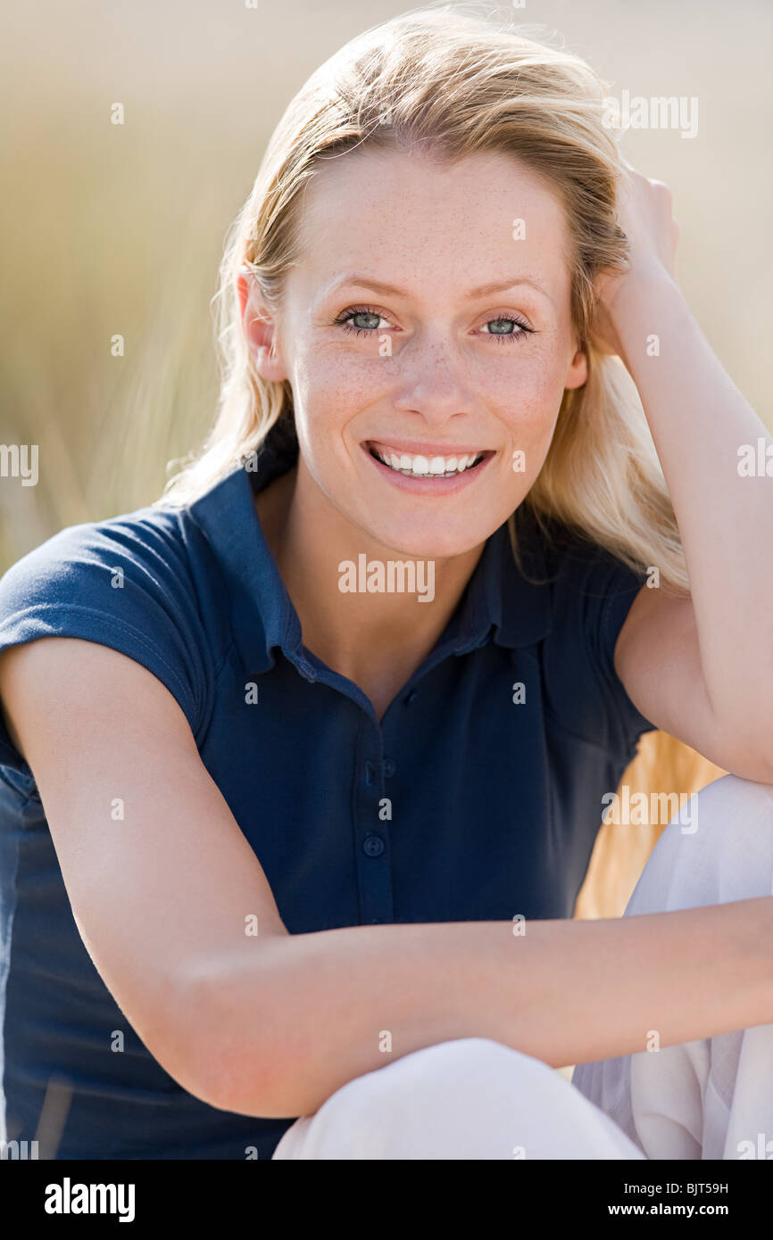Woman light blue polo shirt hi-res stock photography and images - Alamy
