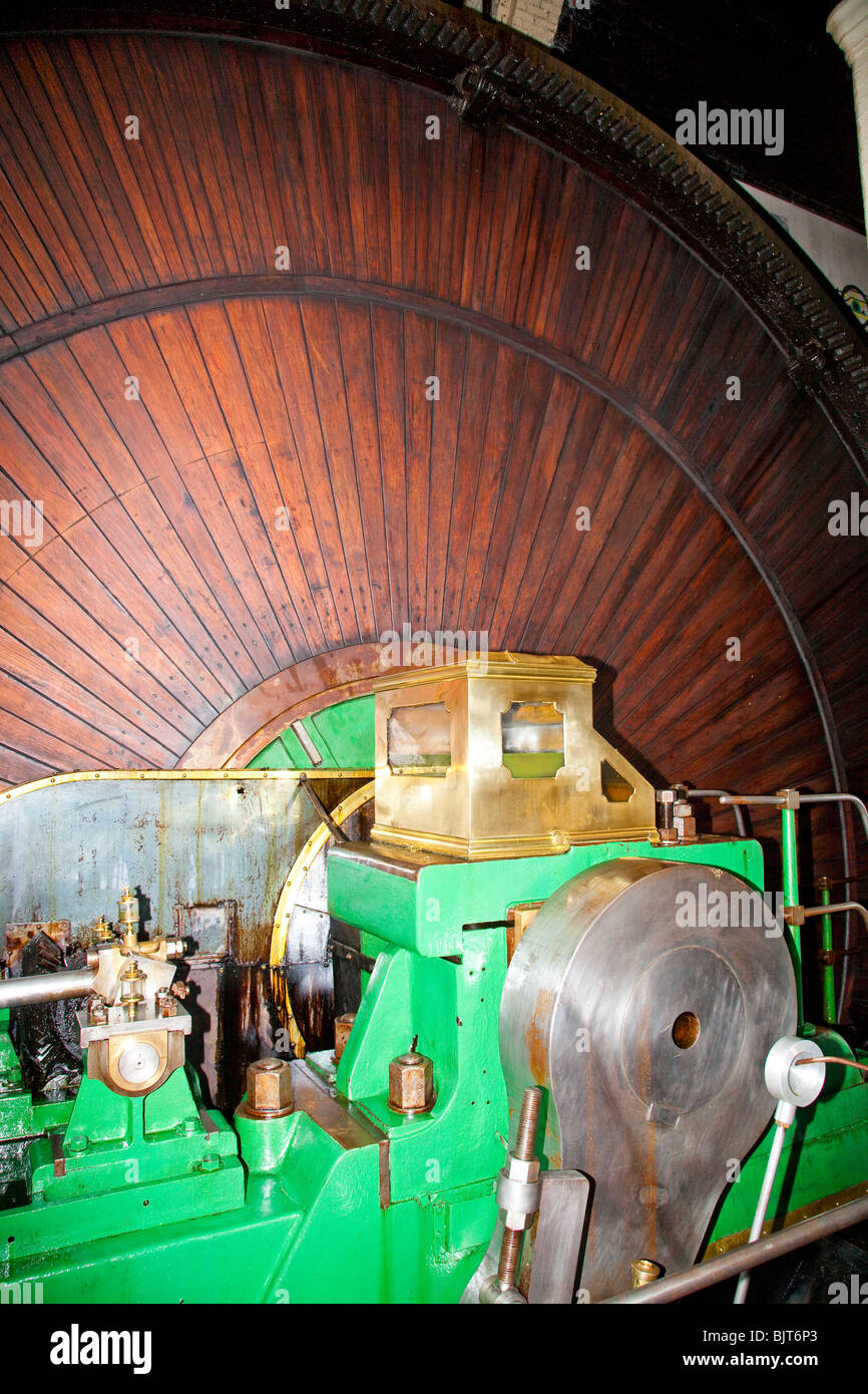 Wooden paneling on steam engine flywheel Stock Photo