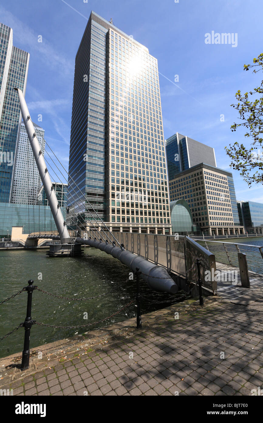 Canary Wharf with Wilkinson Bridge spanning West India Dock. Stock Photo